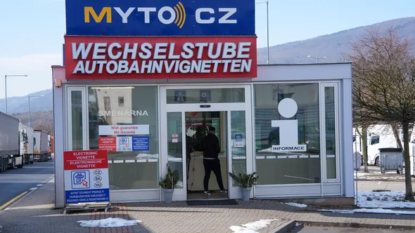 MYTO CZ vignette sales point and currency exchange (Wechselstube) selling electronic vignettes for Czech Republic, Slovakia and Hungary, on the route from Dresden to Prague, captured on February 20, 2026